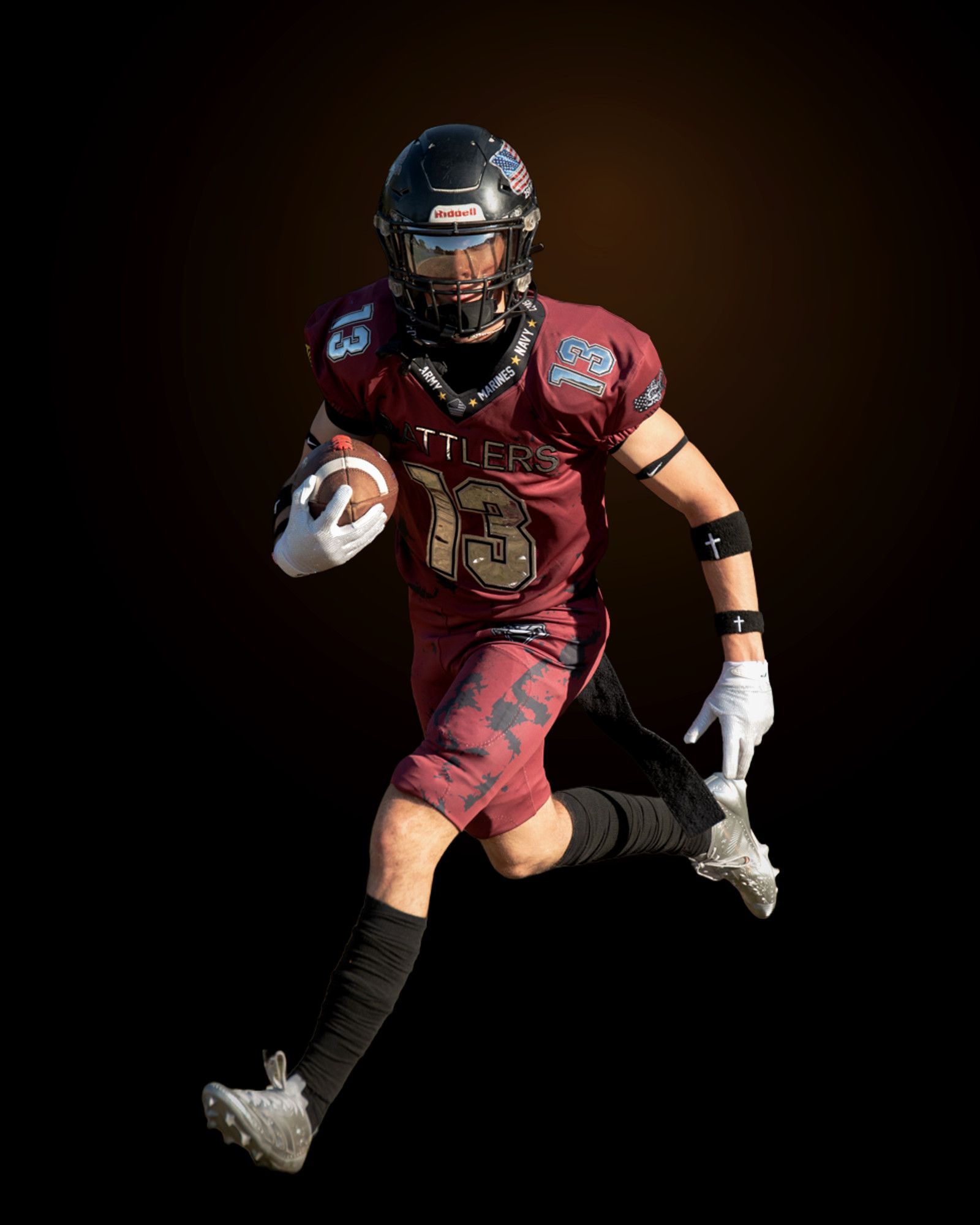 Jack Shepherd running straight at the camera with the ball tucked, knee driving high.